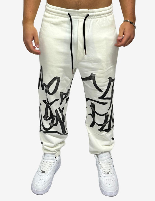 Pantalone Comme des Fuckdown in felpa con logo graffiti uomo