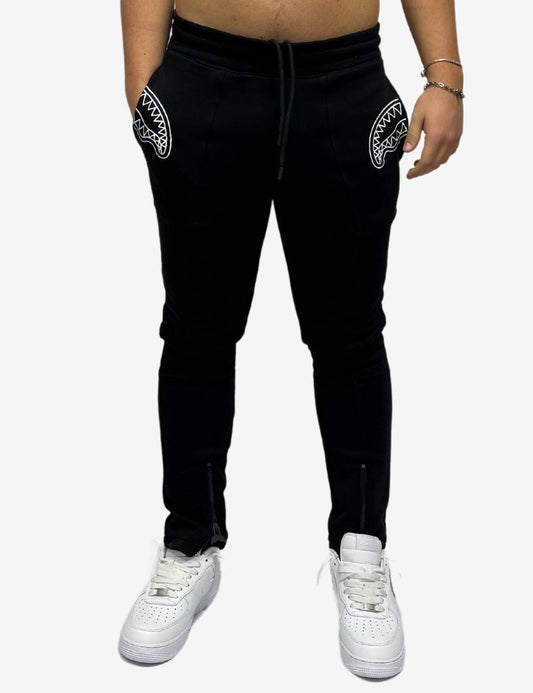 Pantalone con logo shark stampato e zip SPRAYGROUND