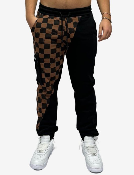 Pantalone bicolor con trama a scacchi e tasca logata SPRAYGROUND